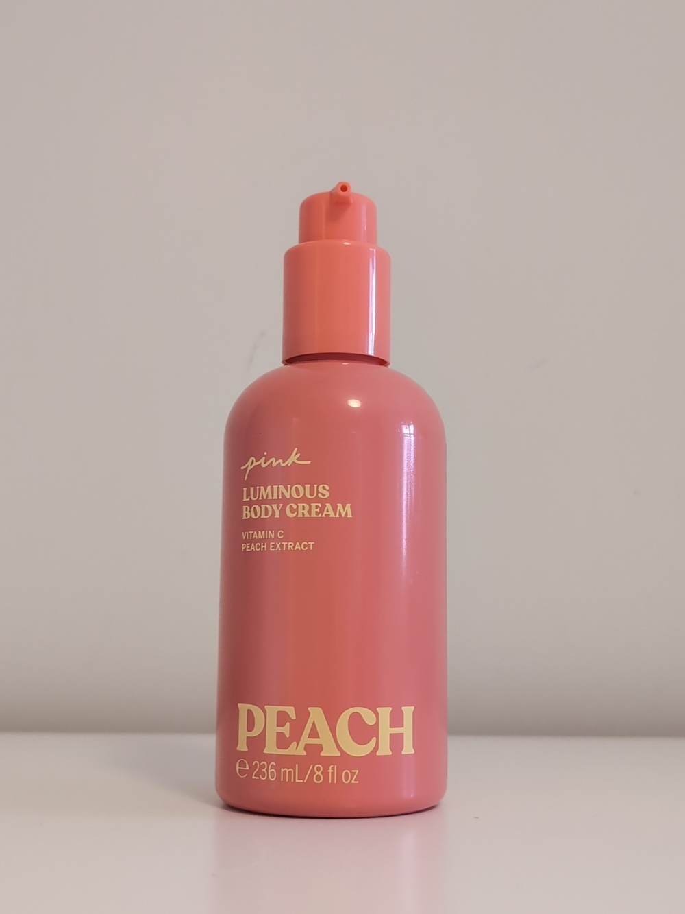 PINK Victoria's Secret Peach Luminous Body Cream - Coral Pink Bottle